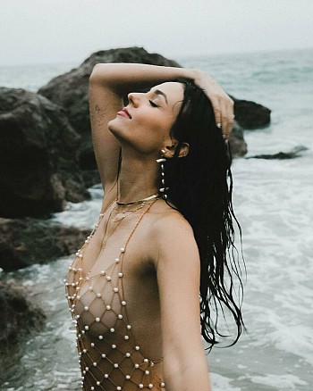 Victoria Justice Heats Up the Beach in Sultry Outfits for ‘Down’ Video Shoot