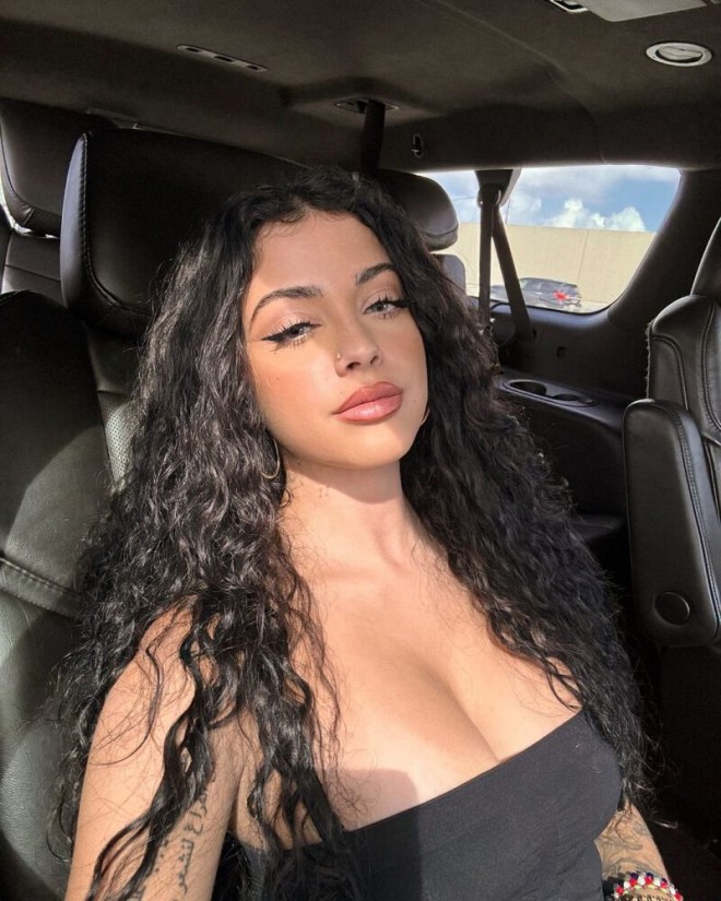 Malu Trevejo’s Busty Black Top Selfies: Boobs and Cleavage Galore