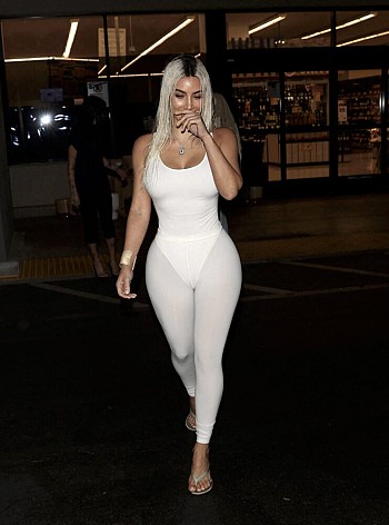 Kim Kardashian’s Sexy West Hollywood Stroll: Curvy Body & Eye-Popping Boobs!
