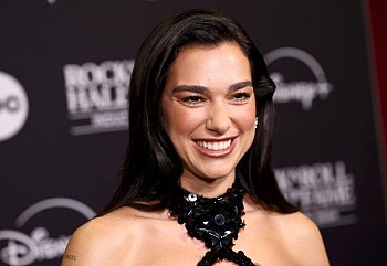 Dua Lipa Rocks a Sexy Dress and Flaunts Her Long Legs at 2024 Rock & Roll Hall of Fame!